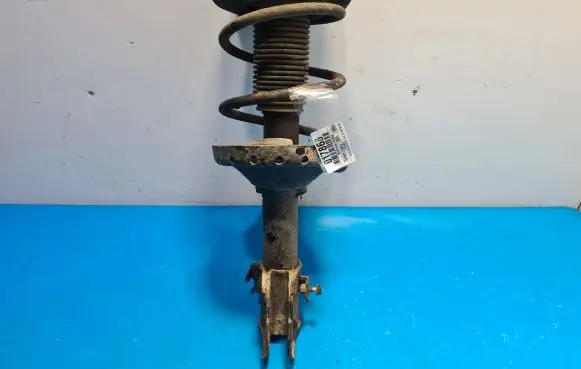 Subaru Legacy Front shock absorber with coil spring