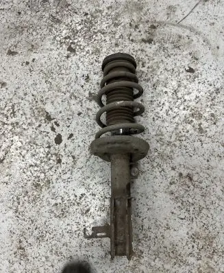 Opel Zafira C Front shock absorber with coil spring 13473993