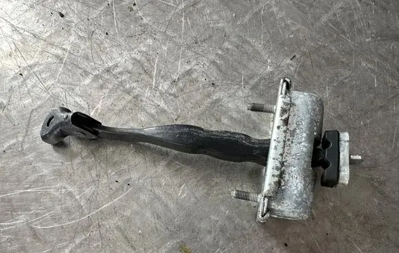 Ford Explorer Rear door check strap stopper