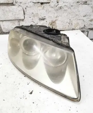 Volkswagen Touareg I Headlight/headlamp 7L6941016BJ