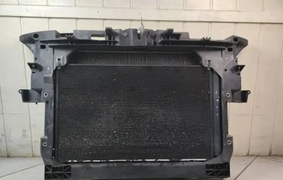 Radiator support slam panel