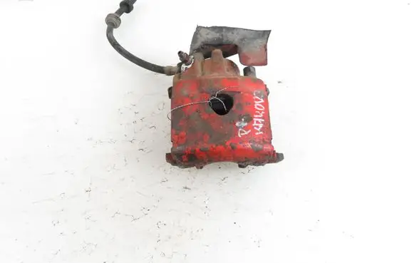 Volkswagen Golf III Front brake caliper 1H0615124C