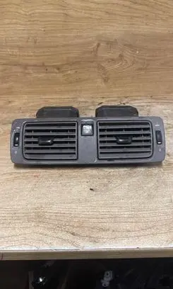 Dash center air vent grill