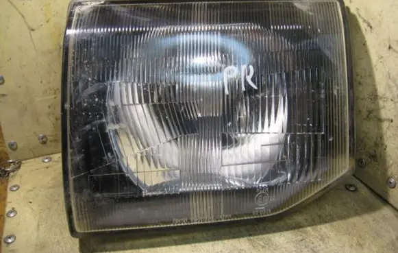 Mitsubishi Pajero Sport I Headlight/headlamp
