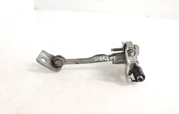 Front door check strap stopper