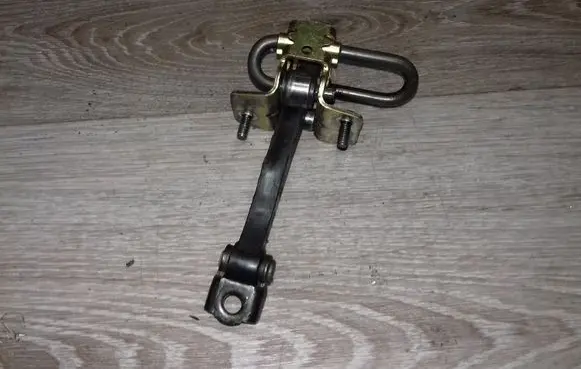Volvo V70 Front door check strap stopper 30661410