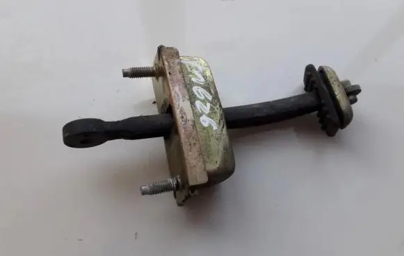 Mazda 626 Rear door check strap stopper