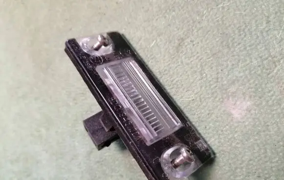 Ford Escort Number plate light 8D0943021 51385