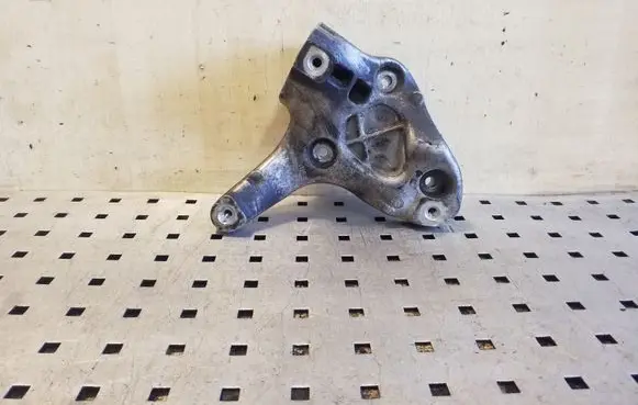 Volkswagen Golf Plus A/C compressor mount bracket 1K0260885B
