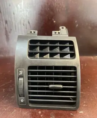 Dash center air vent grill