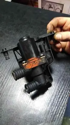 Coolant heater control valve