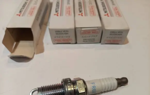Mitsubishi Lancer X Spark plug MN163236