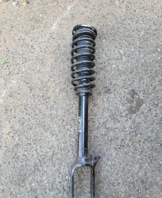 Front shock absorber with coil spring
