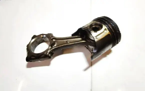 Opel Astra G Piston with connecting rod