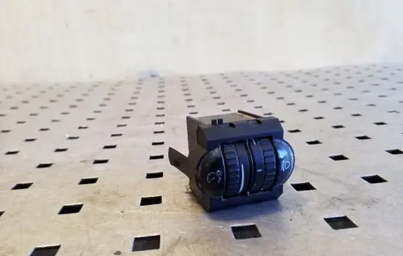 Headlight level height control switch