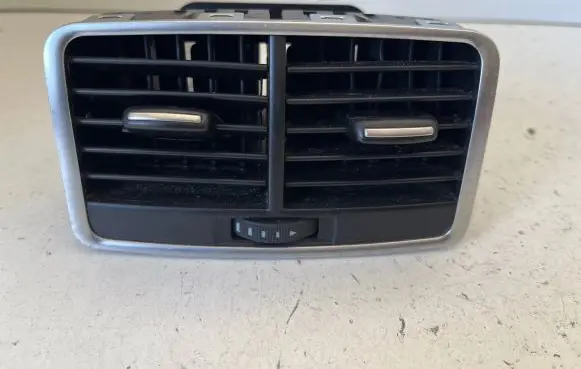 Dash center air vent grill