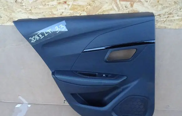Peugeot 208 II Coupe rear side trim panel 