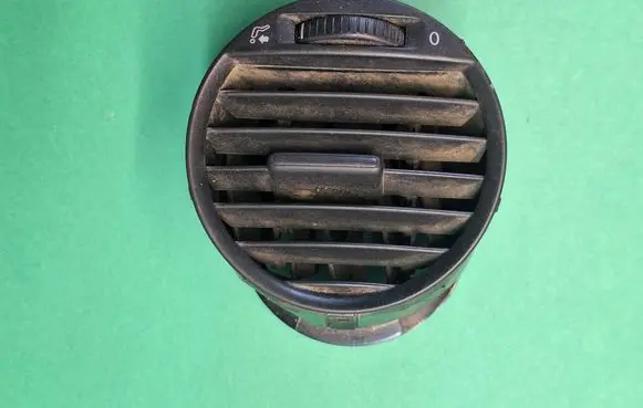 Dash center air vent grill