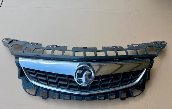 Opel Astra J Front bumper upper radiator grill 13266577