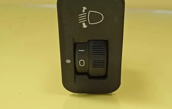 Headlight level height control switch