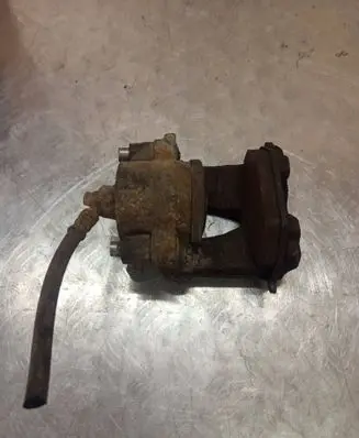 Volkswagen Golf V Front brake caliper 