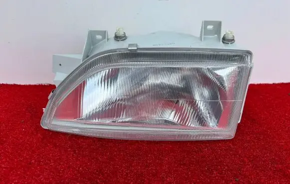 Ford Escort Headlight/headlamp 431-1142L