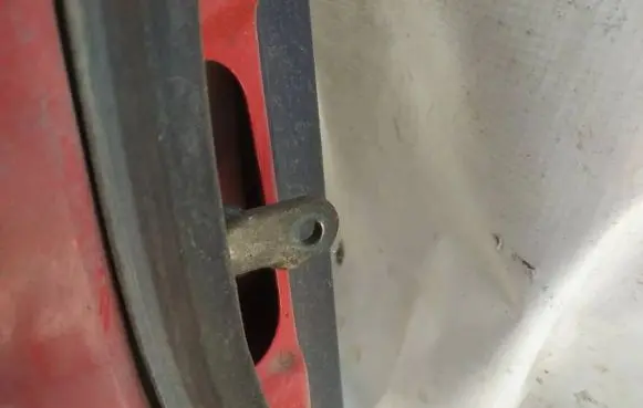 Rear door check strap stopper