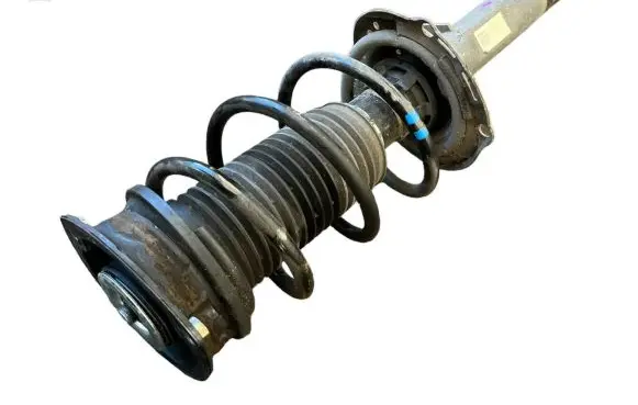 Volkswagen Golf VII Front shock absorber with coil spring 5Q0413023GQ