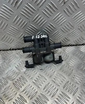 Coolant heater control valve