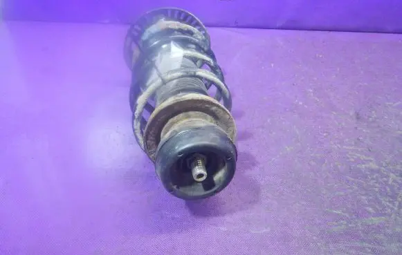Skoda Fabia Mk2 (5J) Front shock absorber with coil spring