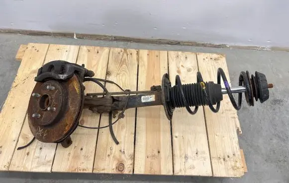 Suzuki Swift III Front shock absorber with coil spring 4160253R00