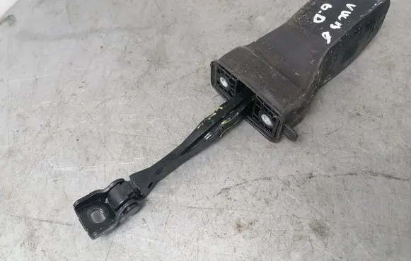 Front door check strap stopper