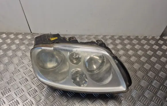 Volkswagen Touran I Headlight/headlamp 1T0941006D