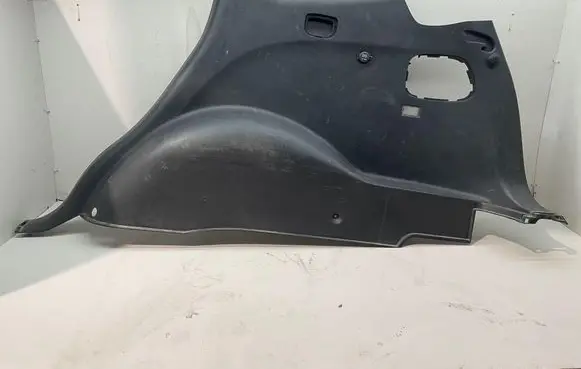 Trunk/boot lower side trim panel
