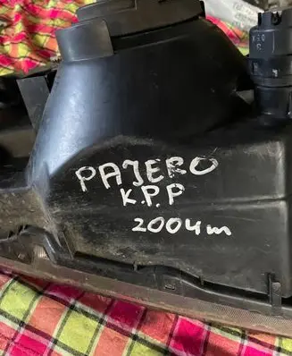 Mitsubishi Pajero Sport I Headlight/headlamp 9928699005