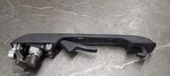 Volkswagen Polo II 86C 2F Front door exterior handle 867837209