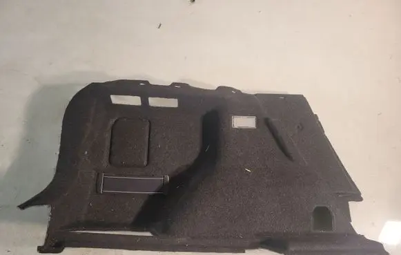 Trunk/boot lower side trim panel