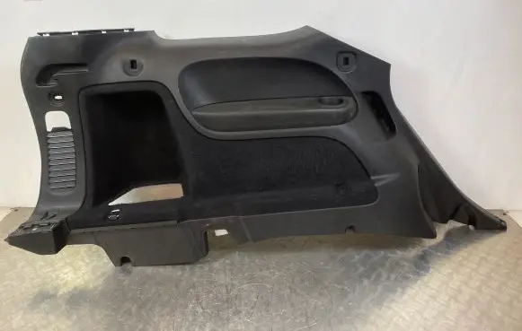 Trunk/boot lower side trim panel