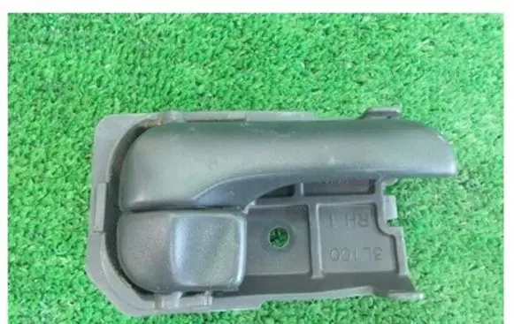 Nissan Maxima Rear door interior handle trim 
