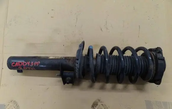 Volkswagen Caddy Front shock absorber with coil spring