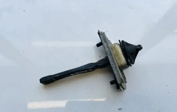 Mazda 323 Rear door check strap stopper