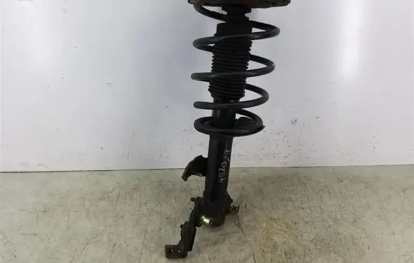 Nissan Primera Front shock absorber with coil spring
