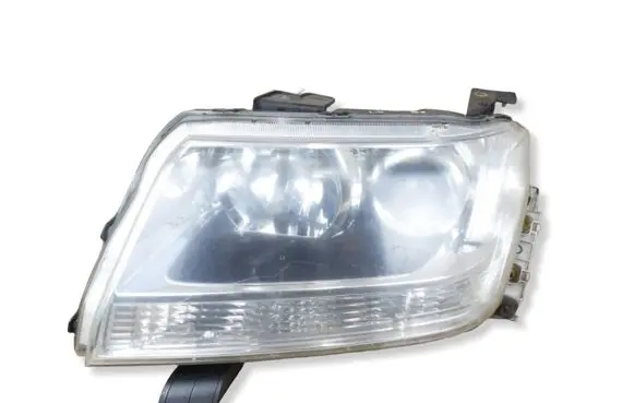 Suzuki Grand Vitara II Headlight/headlamp 10059079