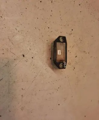 Ford Mondeo Mk III Number plate light 1S7113550AD