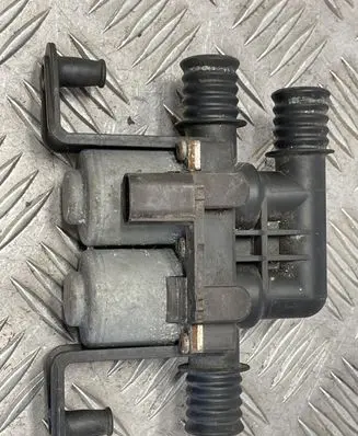 Coolant heater control valve