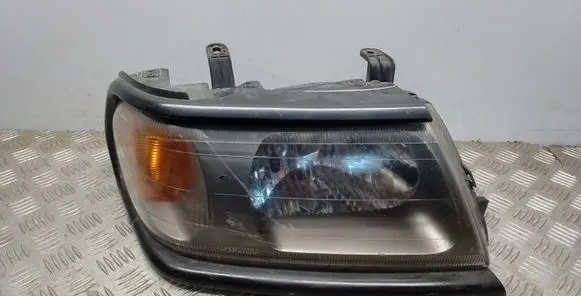 Mitsubishi Pajero Sport I Headlight/headlamp 10087415