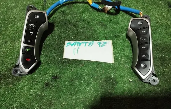 Hyundai Santa Fe Steering wheel buttons/switches 200008508 200008507 967102B000