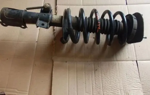 Volvo XC90 Front shock absorber with coil spring