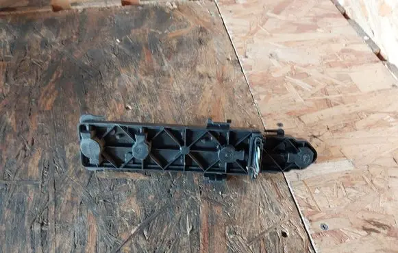 Tail light bulb cover holder