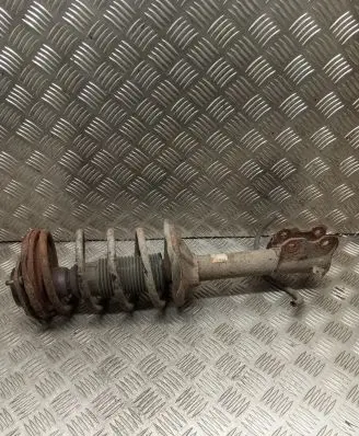 Nissan Almera Front shock absorber with coil spring